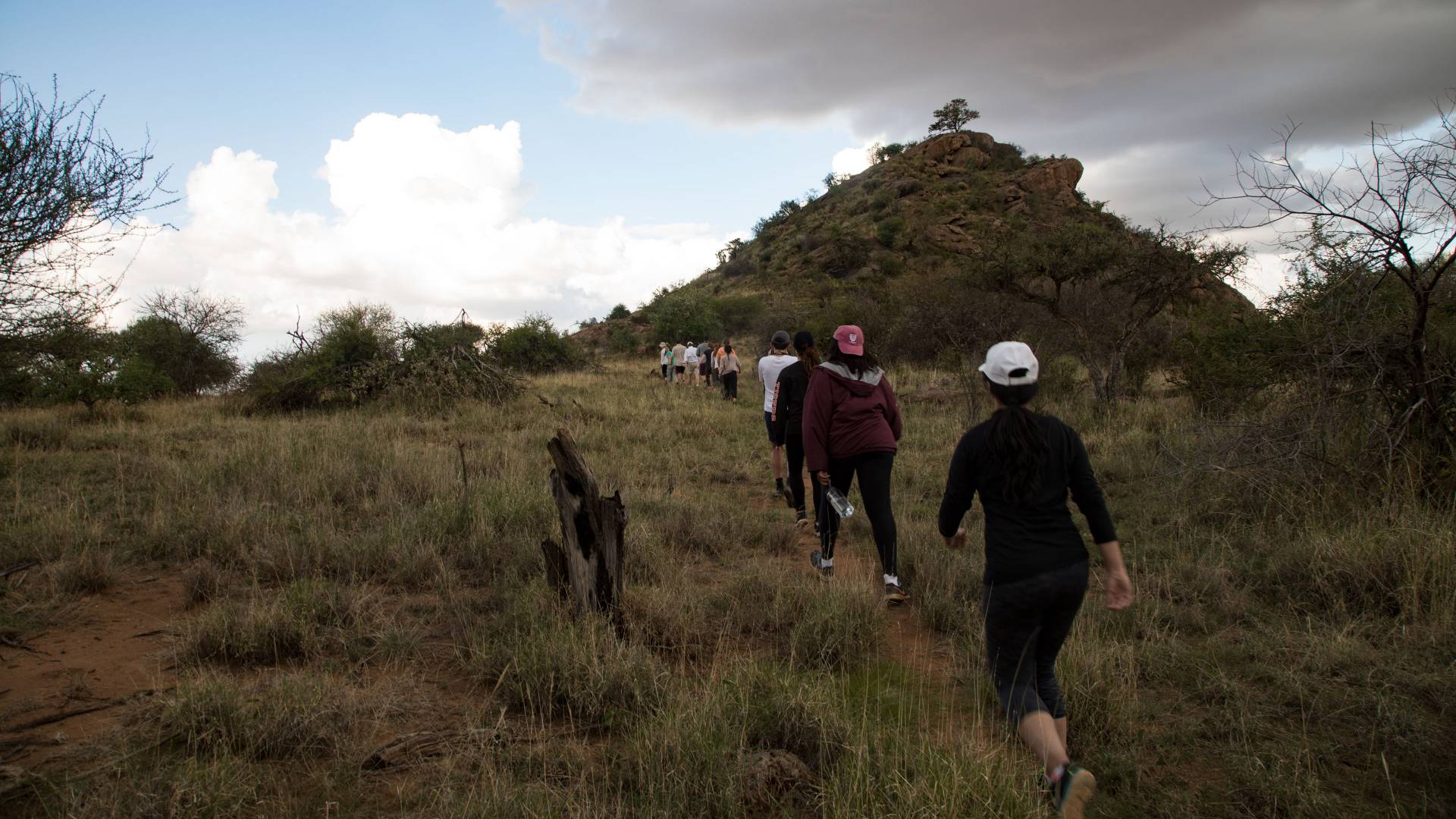 Students hiking up Mt. Mukenya