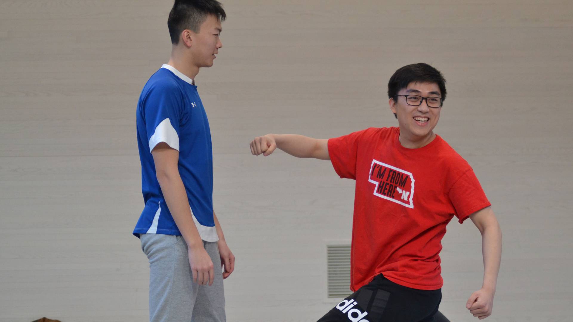 Students practicing unarmed stage combat during wintersession