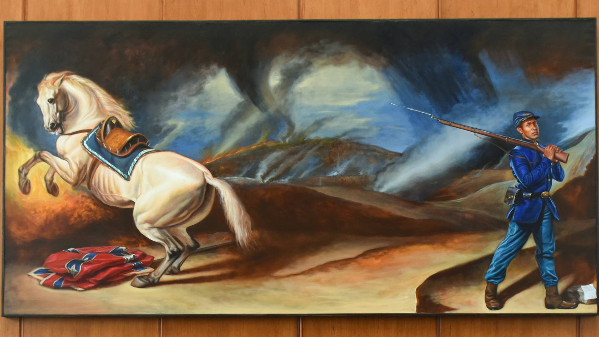 Mario Moore painting of black Civil War soldier with horse trampling Confderate flag.