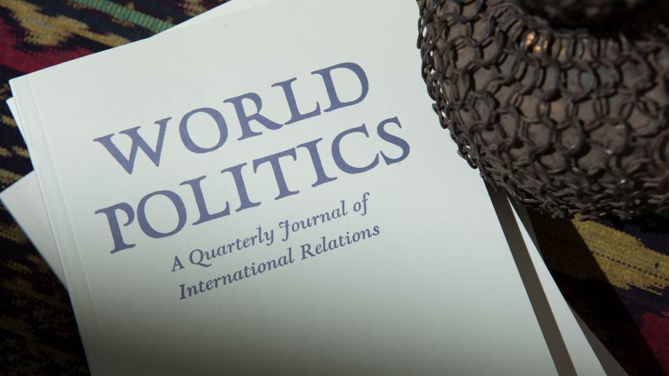 An issue of the journal World Politics lying on a table.