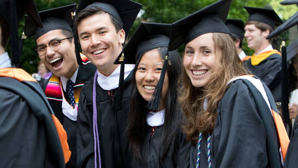 Students smiling during Commencement 2017 ceremony