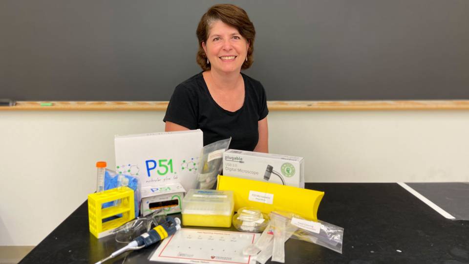 Heather Thieringer poses with science equipment