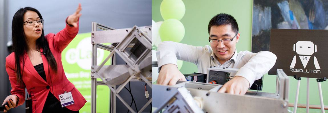Robolution team members Mei Chai Zheng (left) and Weiqui Sun (right) discuss their invention
