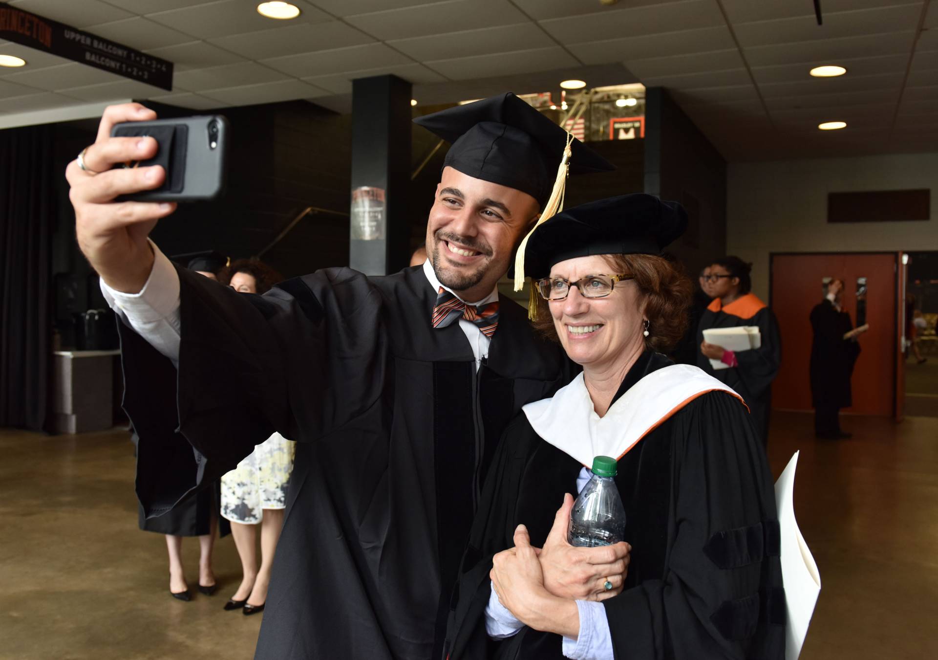 Student takes selfie with advisor