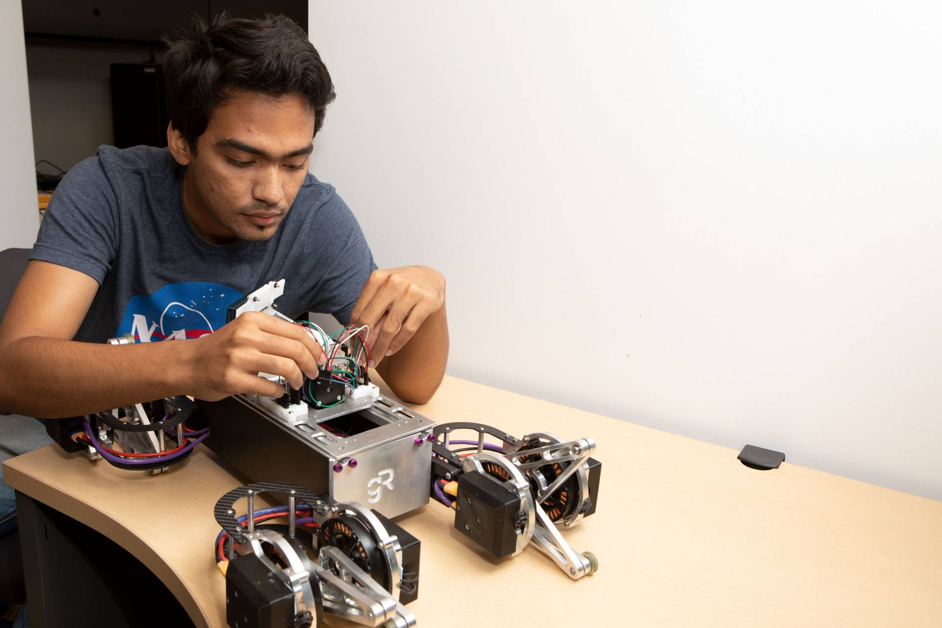 Sourish Ghosh working with robot