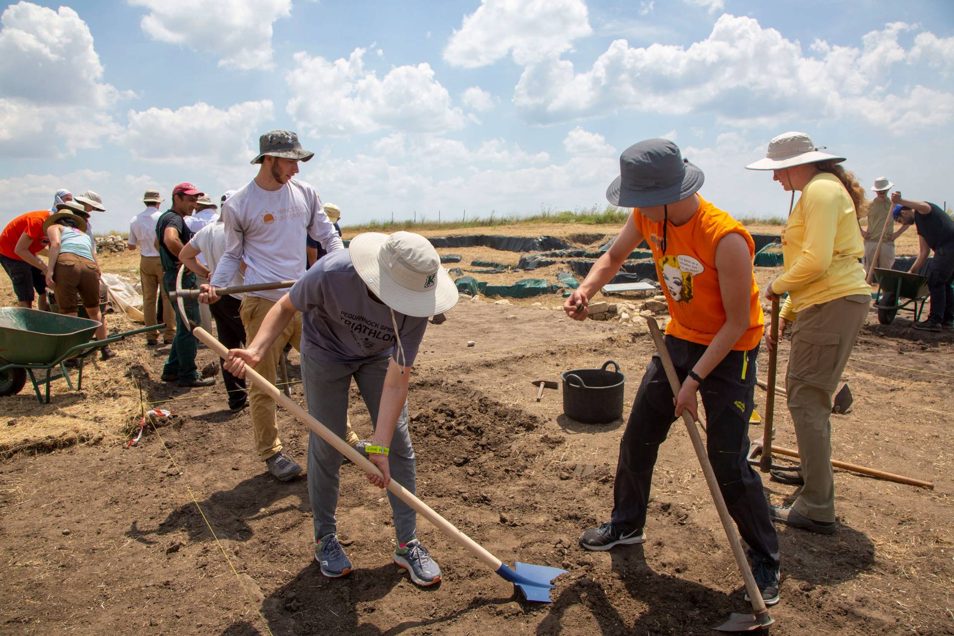 Students digging at site