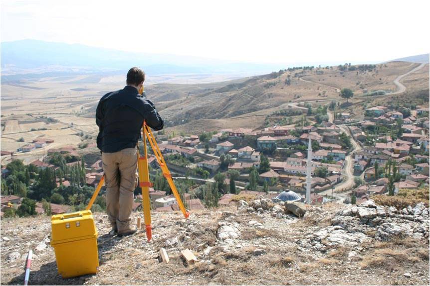Setting up the total station on the edge of the Kale Tepes, Turkey
