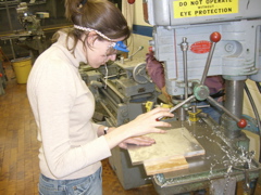 Emily drilling mounting holes