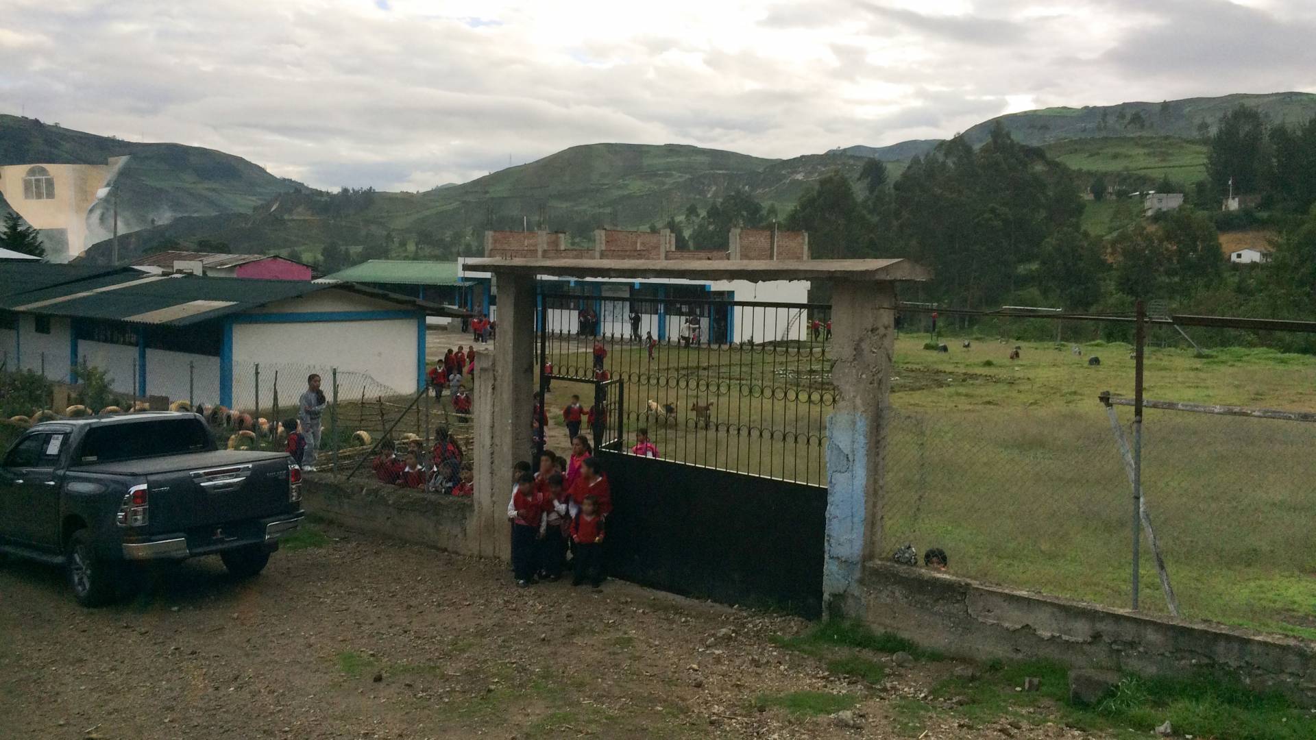 Children leaving school grounds in Ecuador