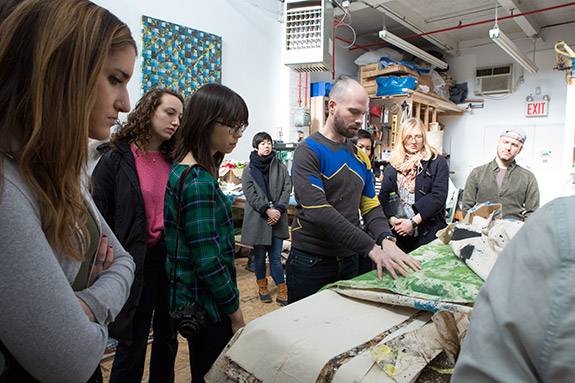 Artist at Work Jonathan VanDyke with students in his studio