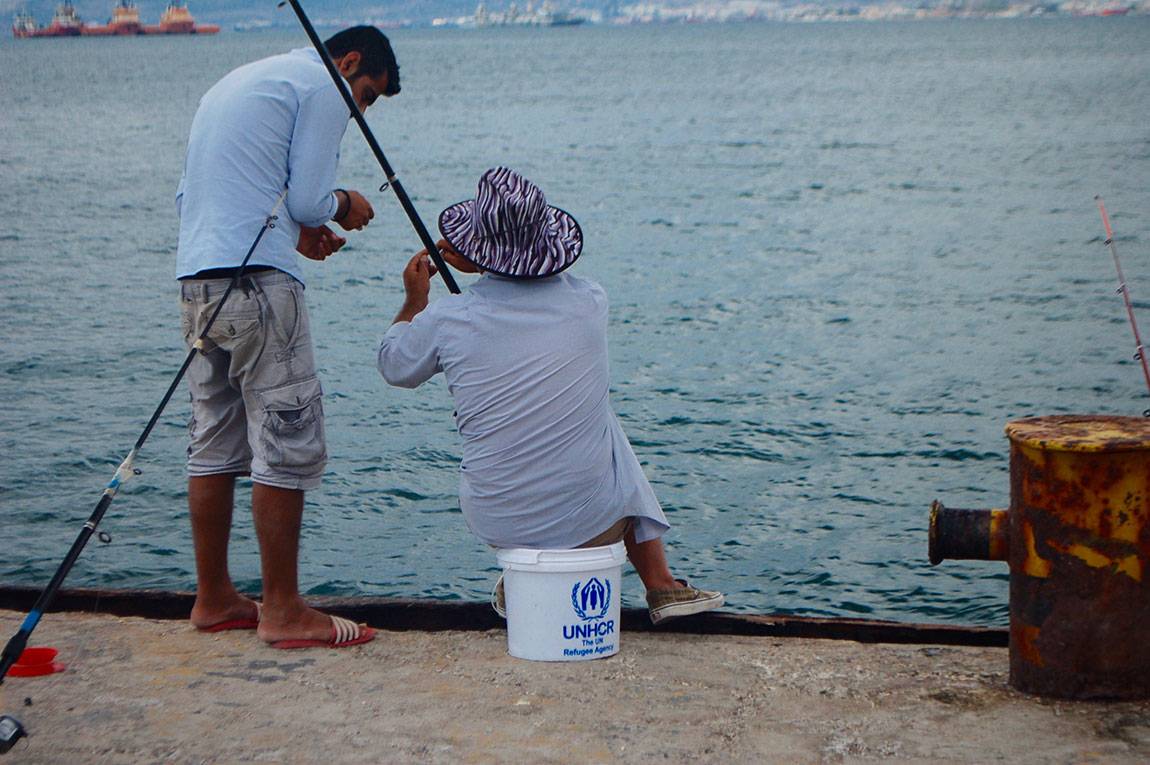 A Tale of Two Countries: Greece - fishing at Skramagas refugee camp