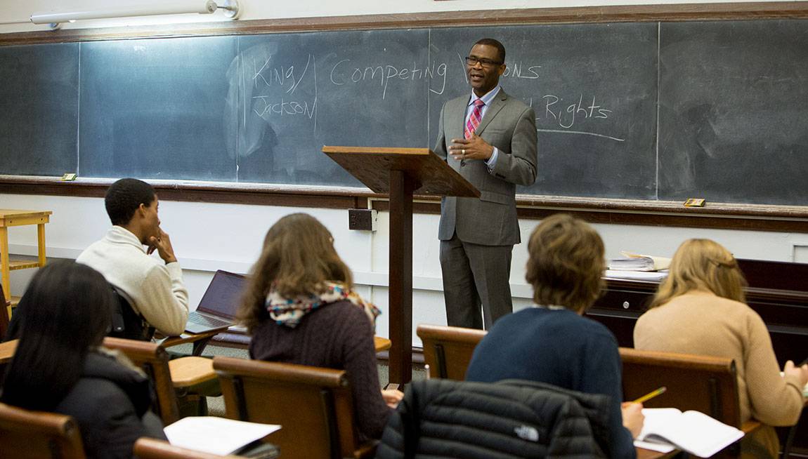 Wallace Best, professor of religion and African American studies, introduces the competing visions of Martin Luther King Jr. and Chicago pastor J.H. Jackson during a lecture on the role of the black church in the civil rights era. 