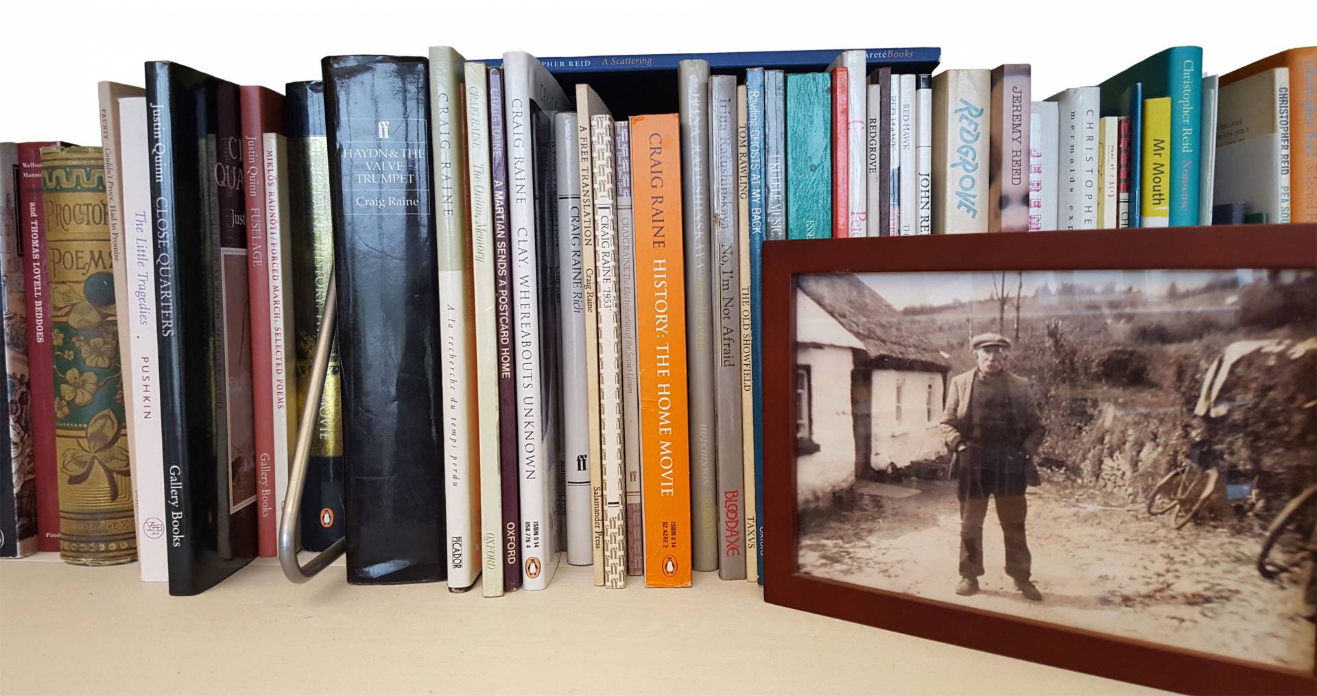 books on shelf in Paul Muldoon's office