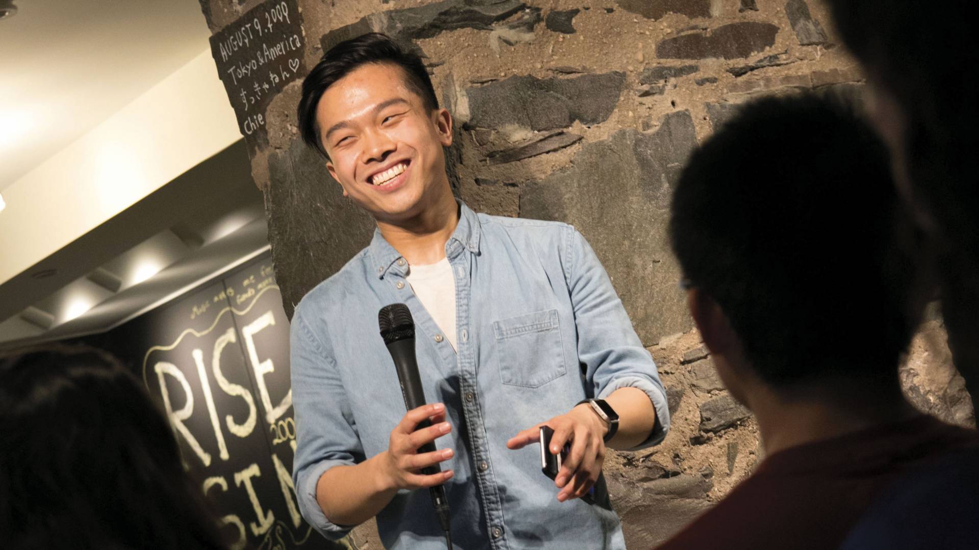 Edric Huang performing at slam poetry event