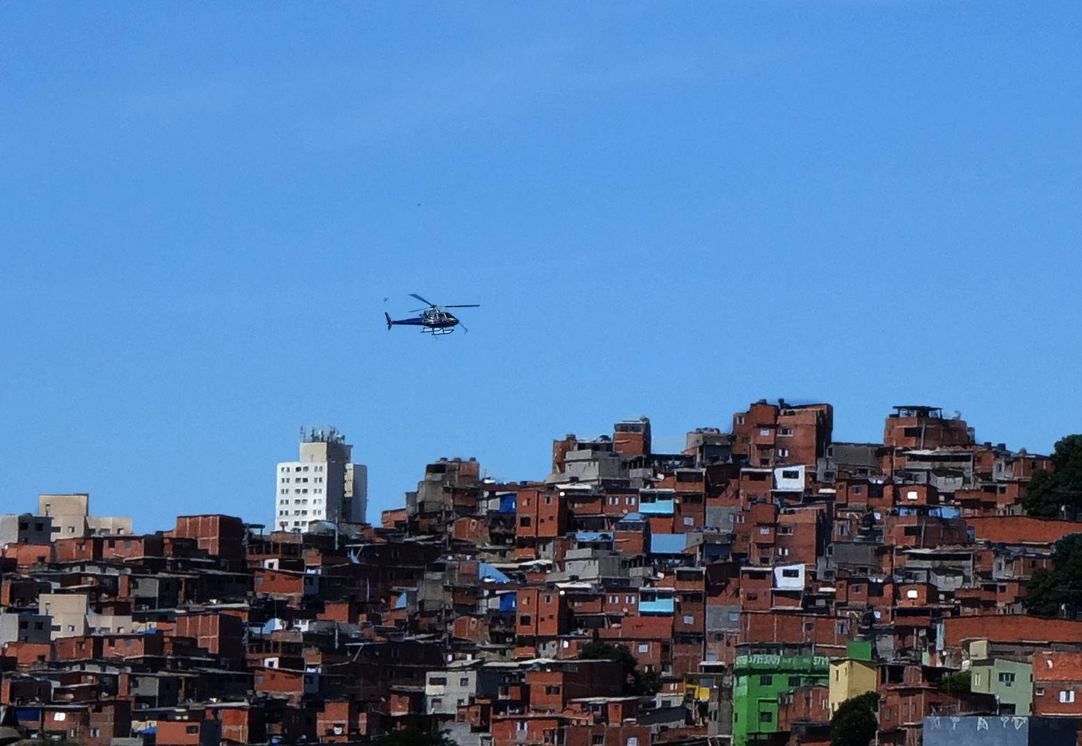 Helicopter flying over city in Brazil