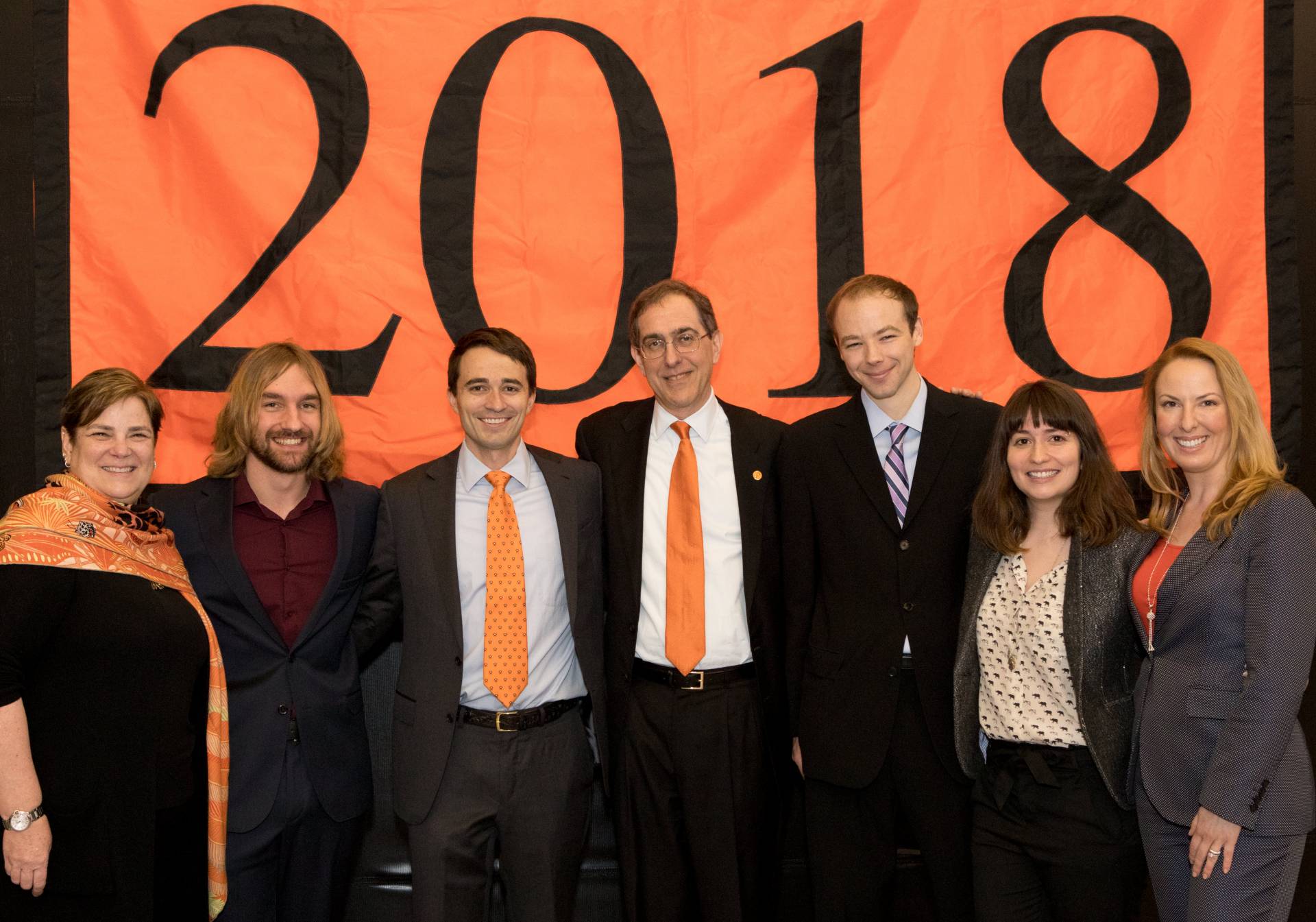 Jacobus Fellowship Winners in front of 2018 Banner