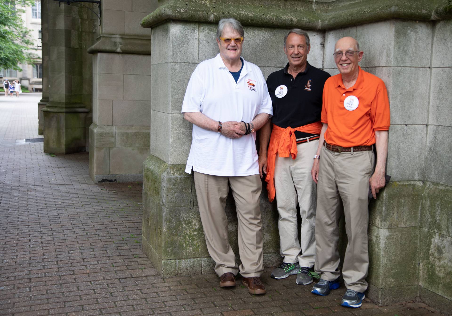 Ed Cadman '68, Jack Warner '68 and Norm Cubanski '68 standing outside McCosh