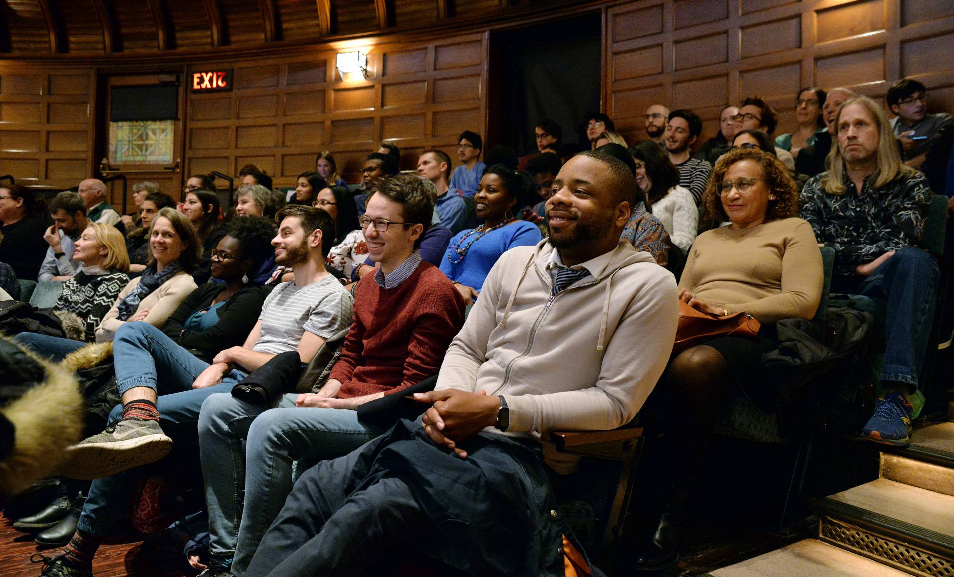Audience members laugh during Ta-Nehisi Coates' lecture