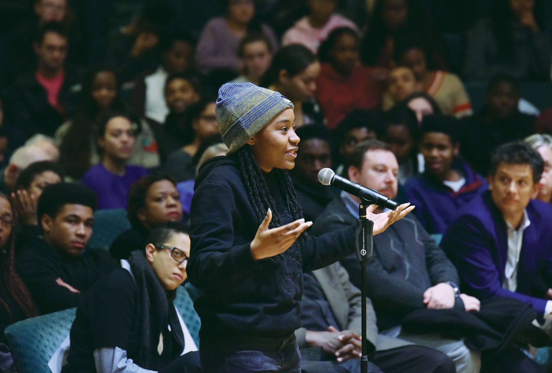 A students poses a question to Ta-Nehisi Coates