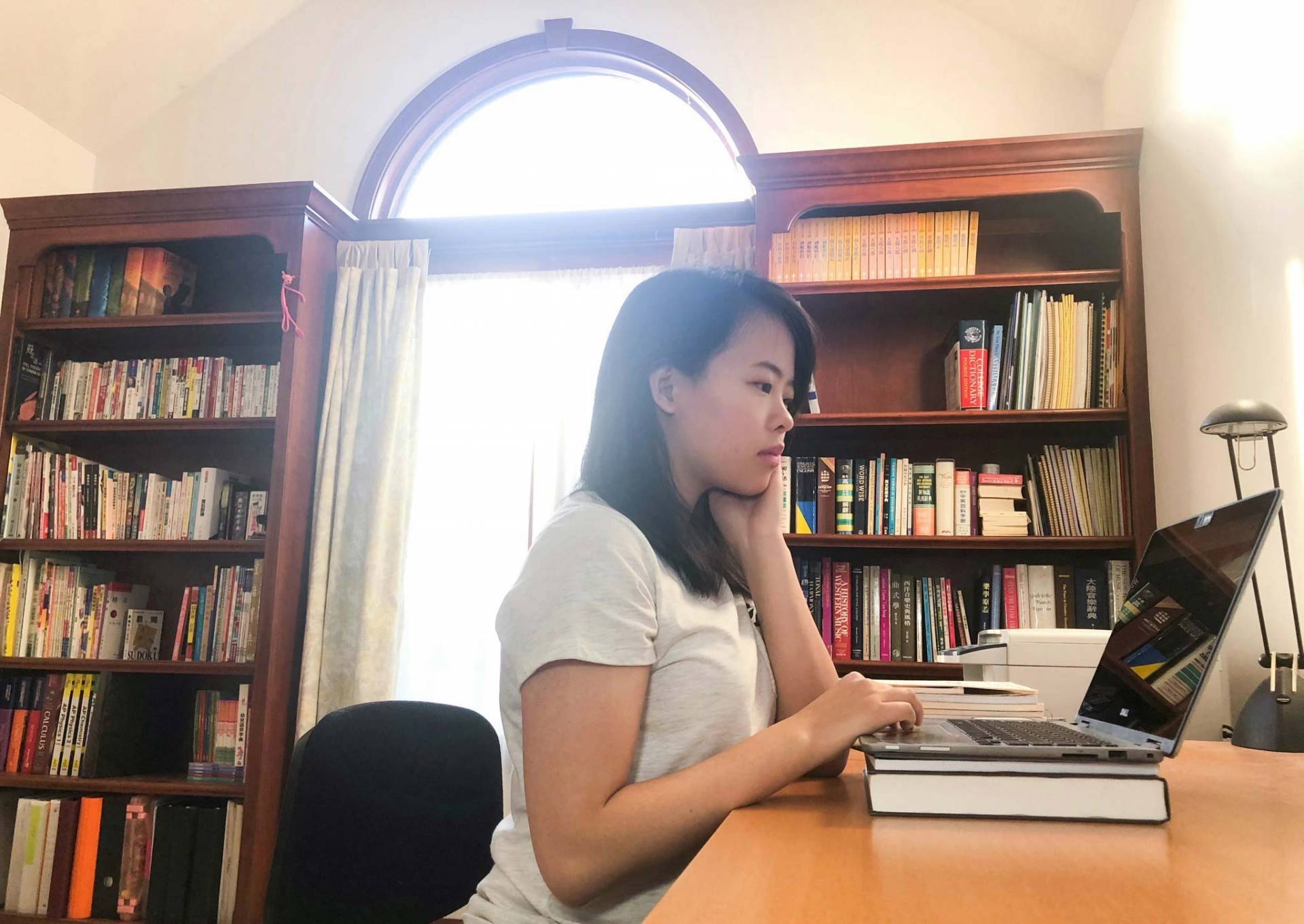 Audrey Shih works at home on a laptop