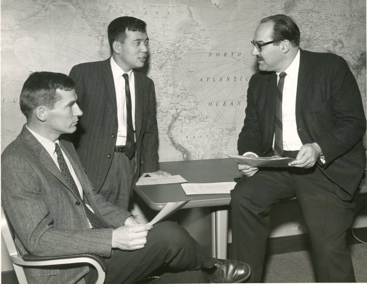 archival image of researchers meeting at the Geophysical Fluid Dynamics Laboratory