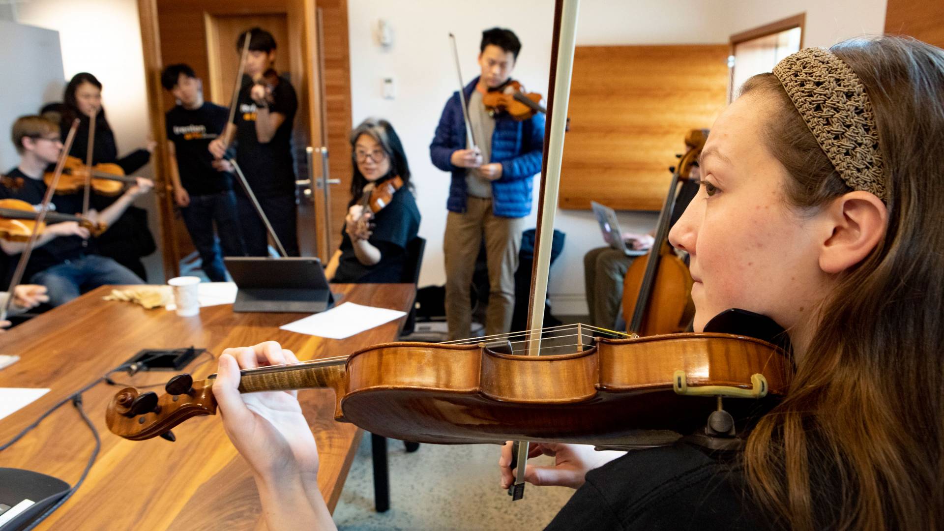 Anna Lim leads a strings lesson