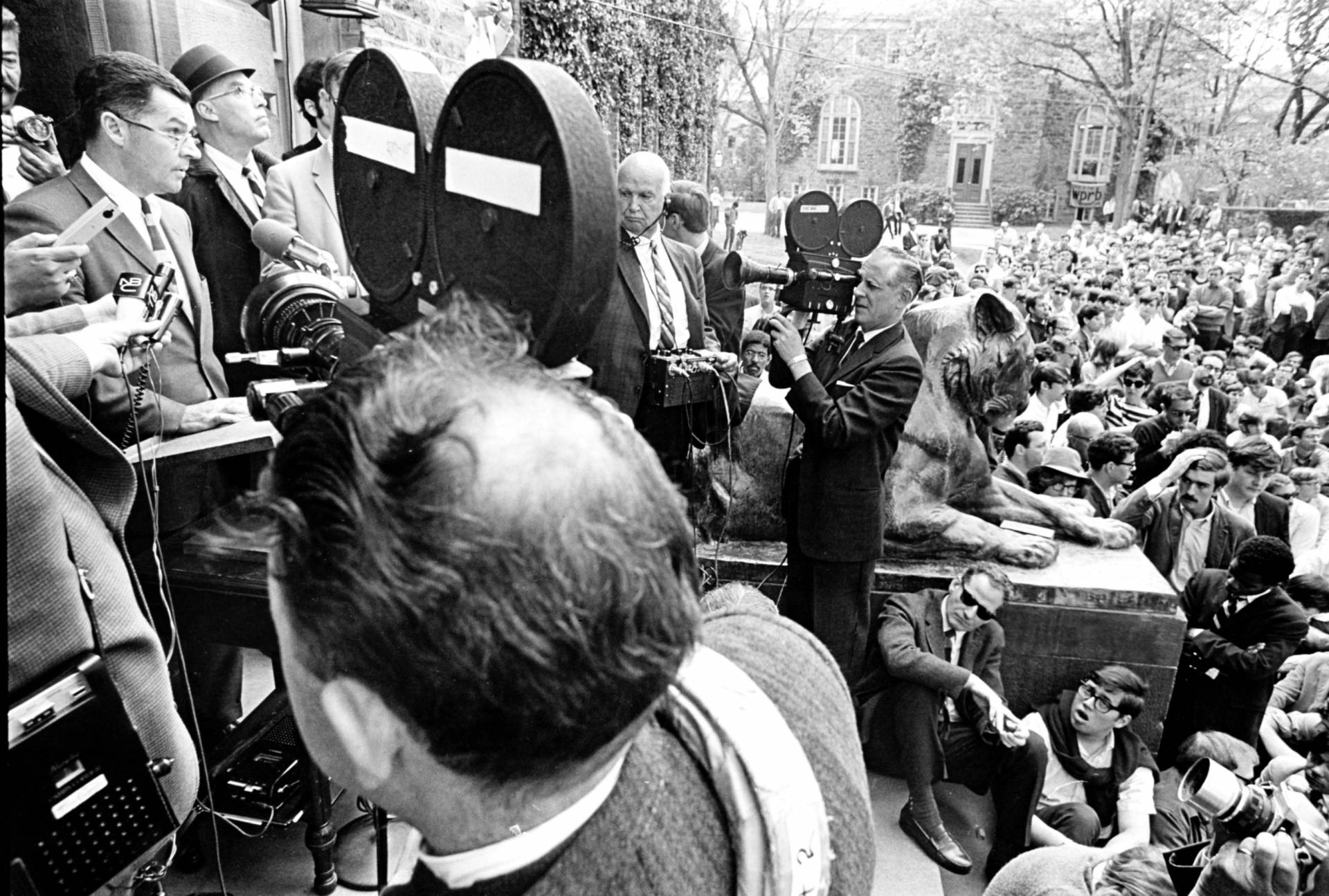 archival photo showing Robert F. Goheen addressing a crowd protesting the Vietnam War