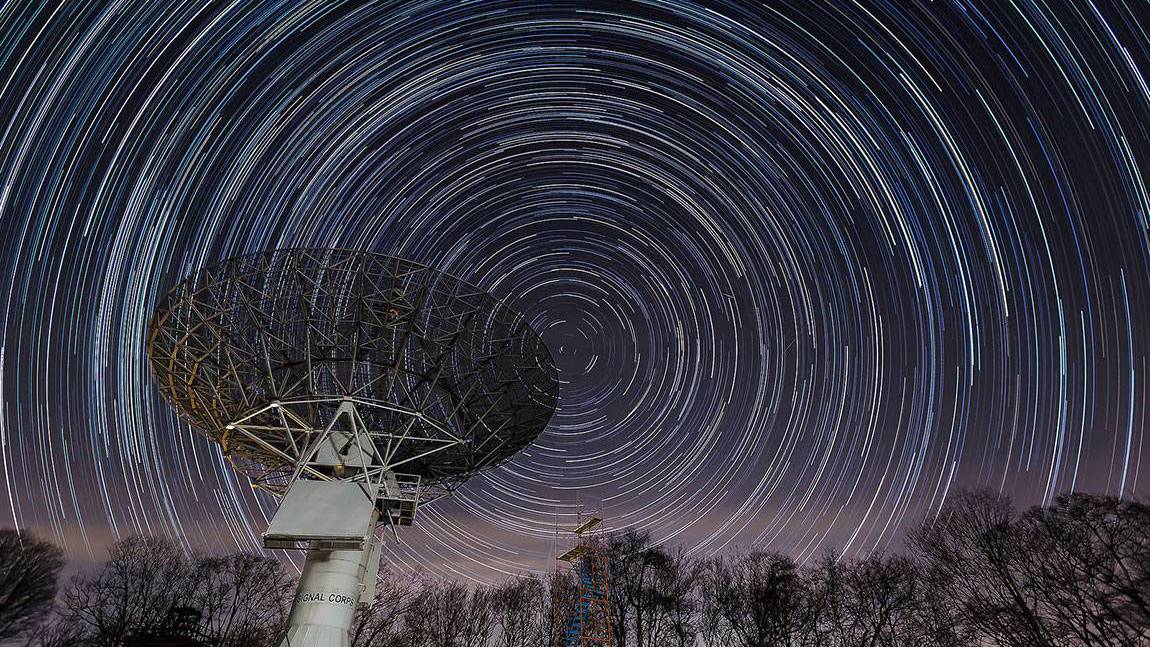 telescope against a starry sky