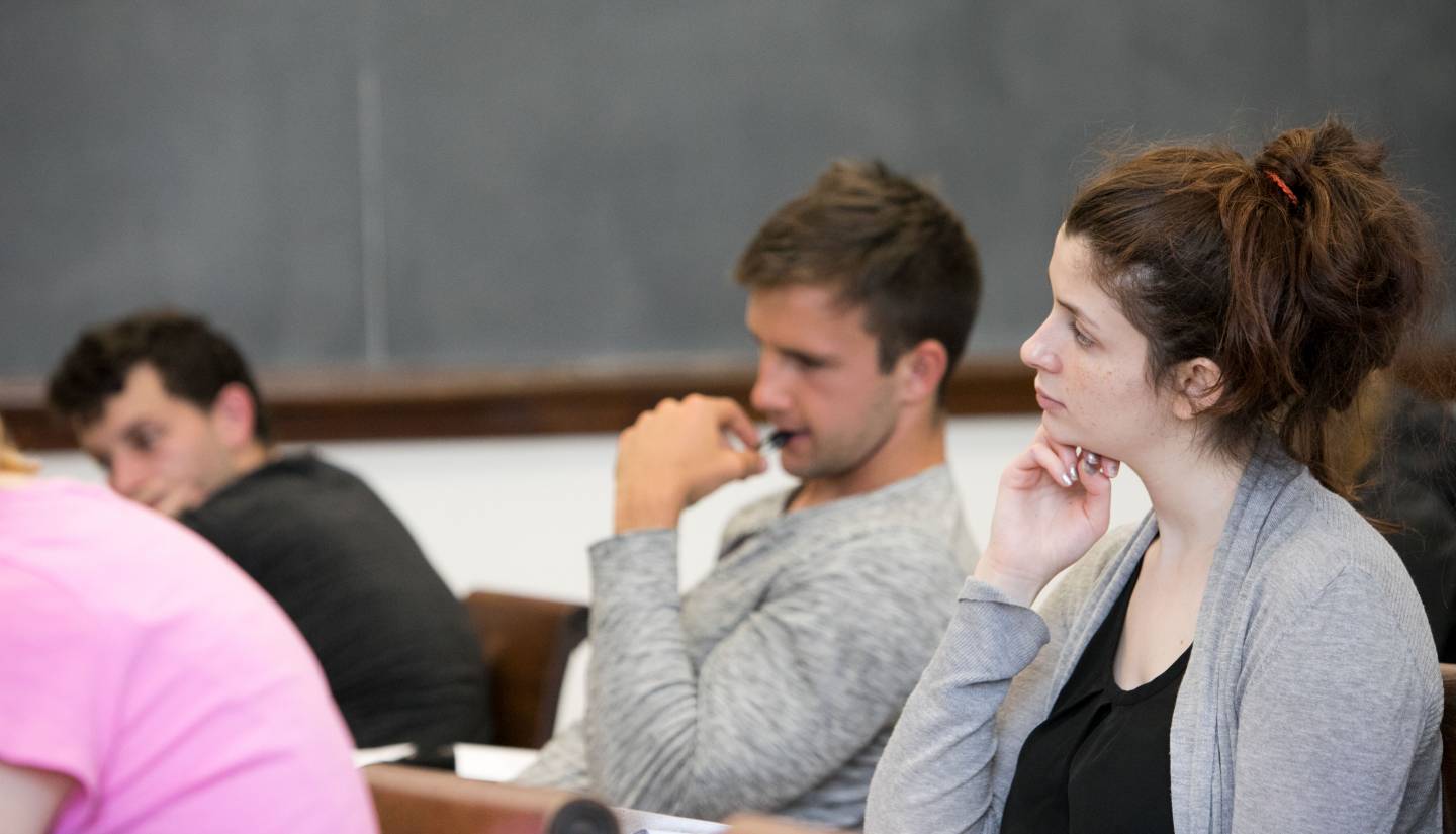 Students in classroom listening to professor