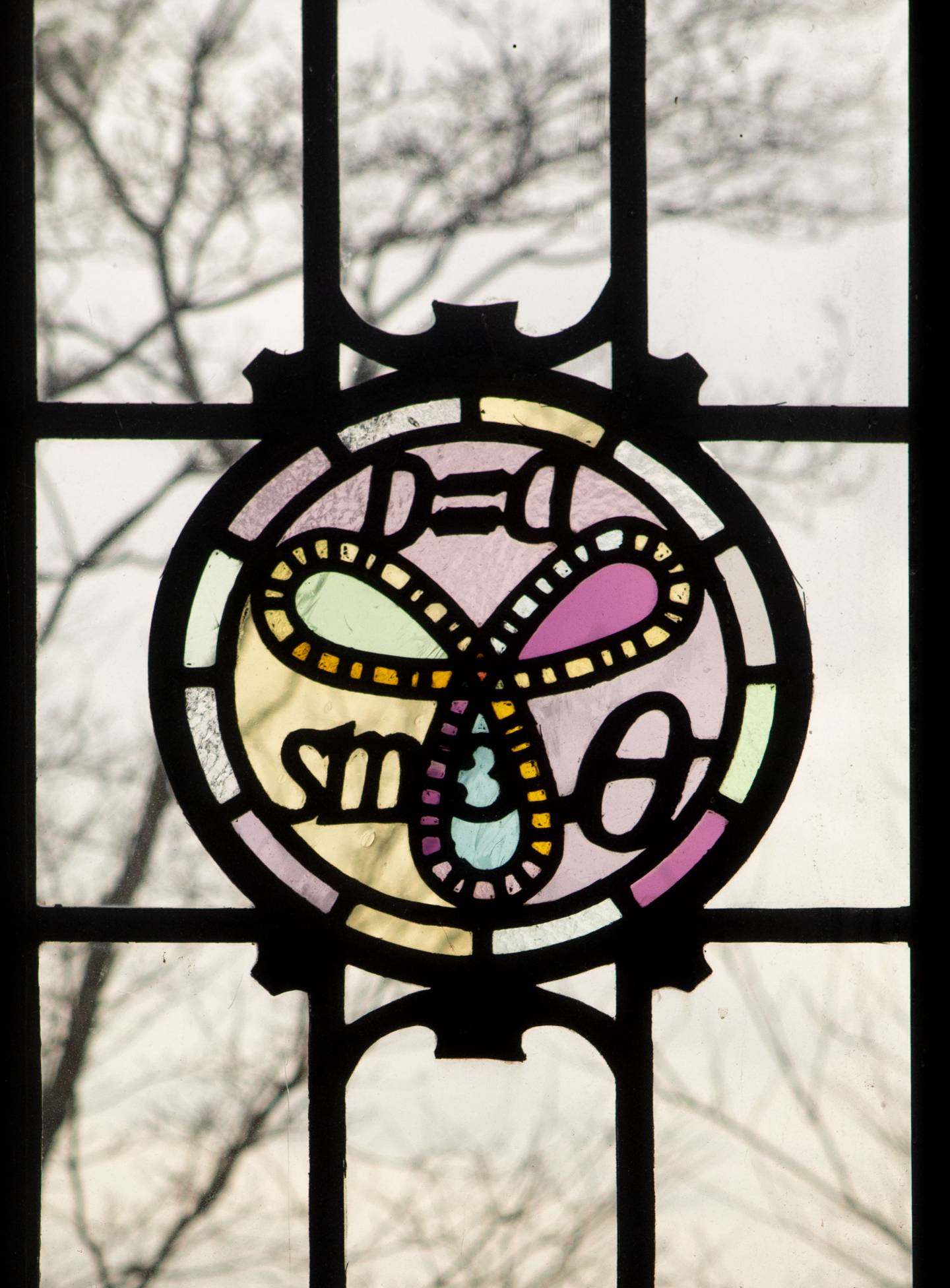 Fine Hall window with math formula in stained glass