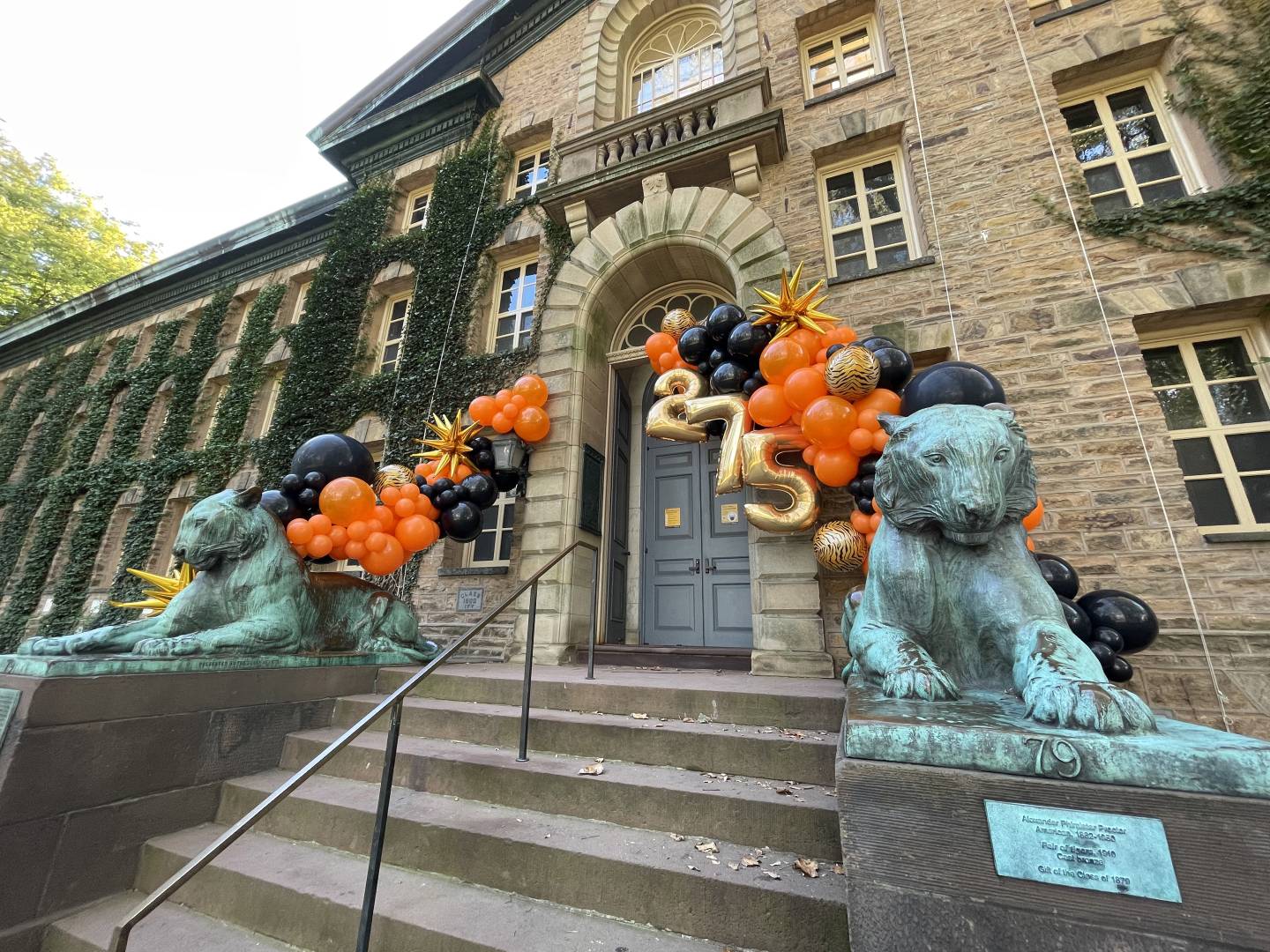 Nassau Hall tigers with orange and black balloons