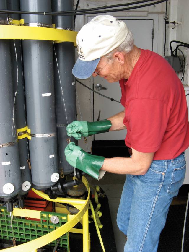 Robert Key adjusts instruments aboard research vessel