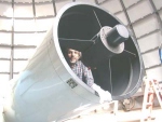 Dr. Cava in a telescope