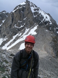 Dave Standing on near the Black Dike on the Grad Teton with Middle Teton in Background
