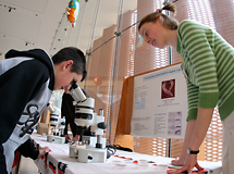 Christine Stahl shows off microscopic worms