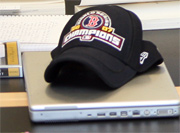 hat on laptop