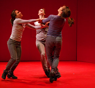 Three dancers in a circle