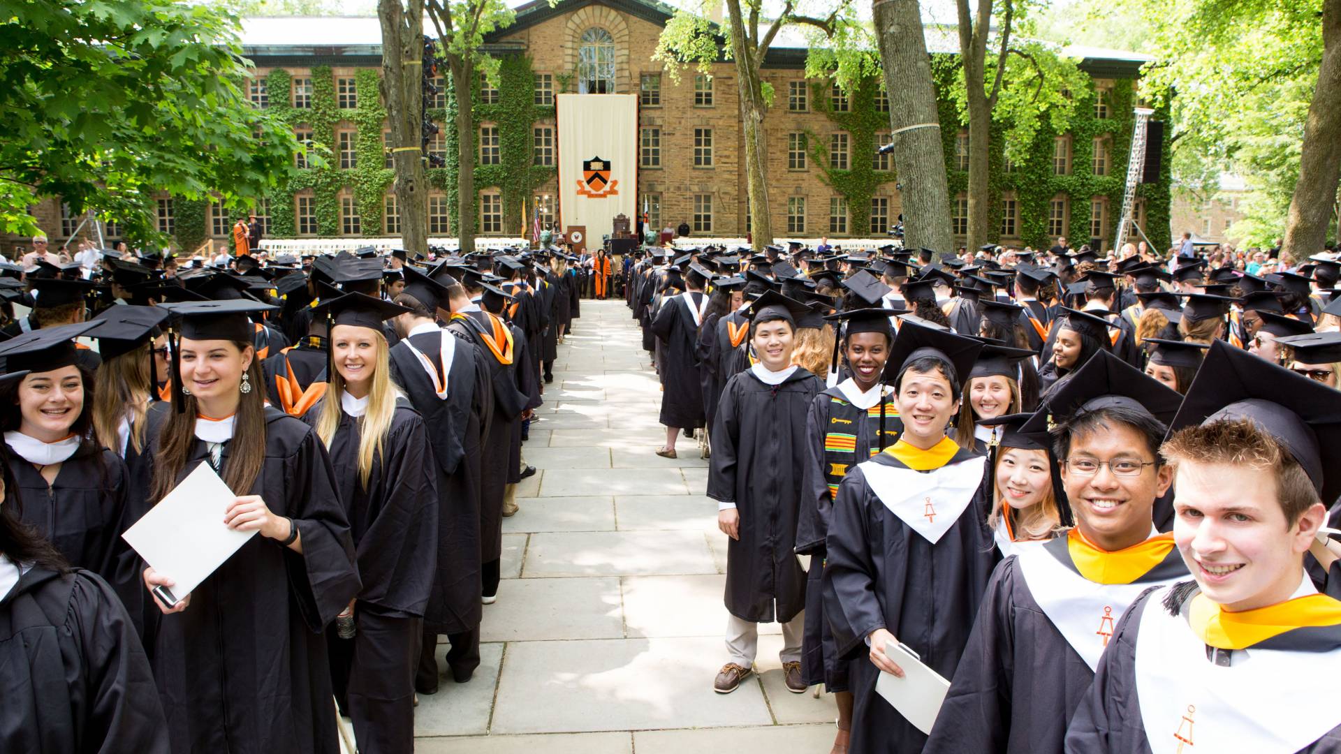 Students standing in front of Nassau Hall for Commencement