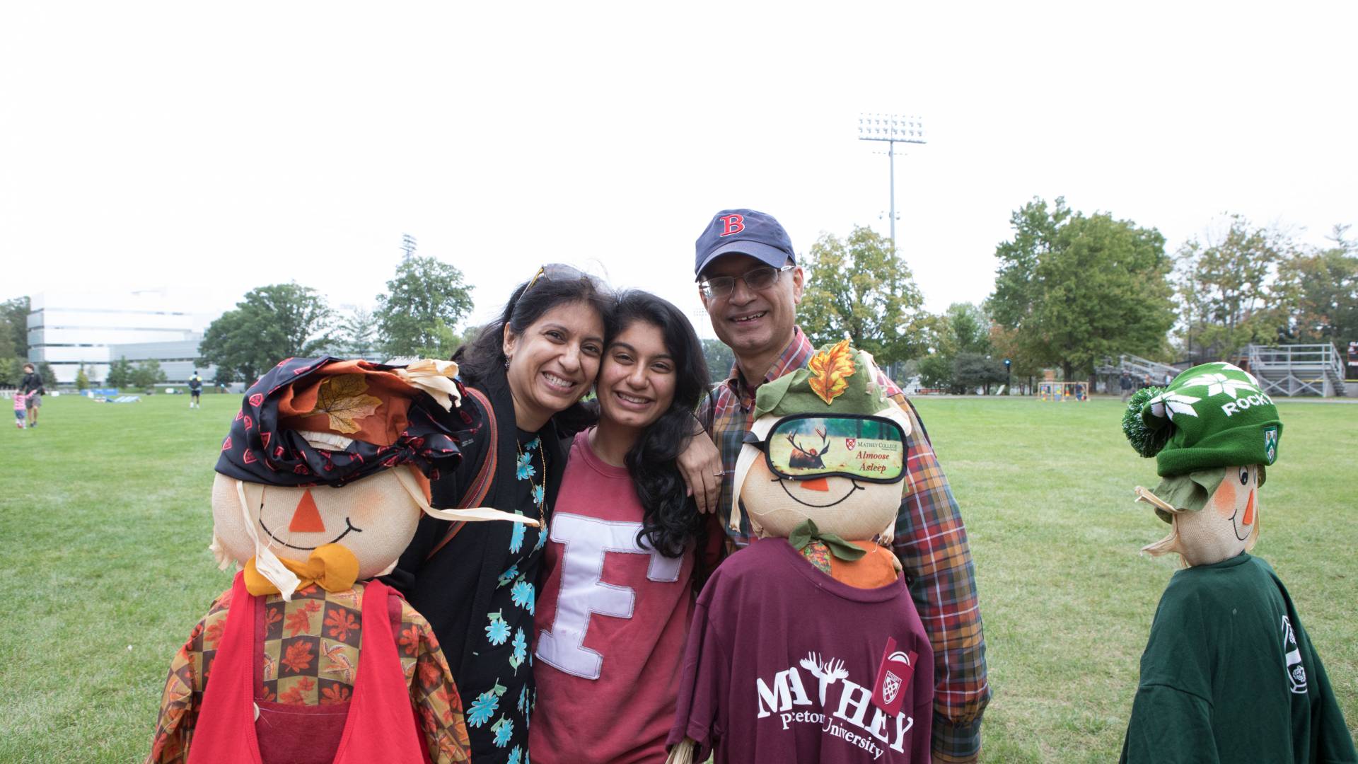 Vrinda Madan and her parents, Alka Madan and Atul Madan on Poe Field