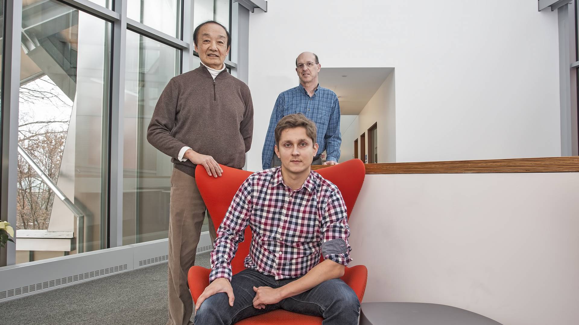 standing from left, Willliam Tang and Eliot Feibush, with Alexey Svyatkovskiy, seated.