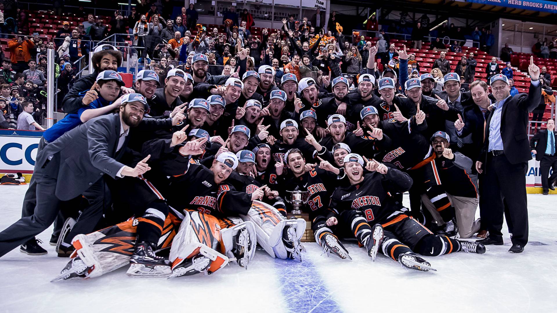 Men's hockey team celebrating win