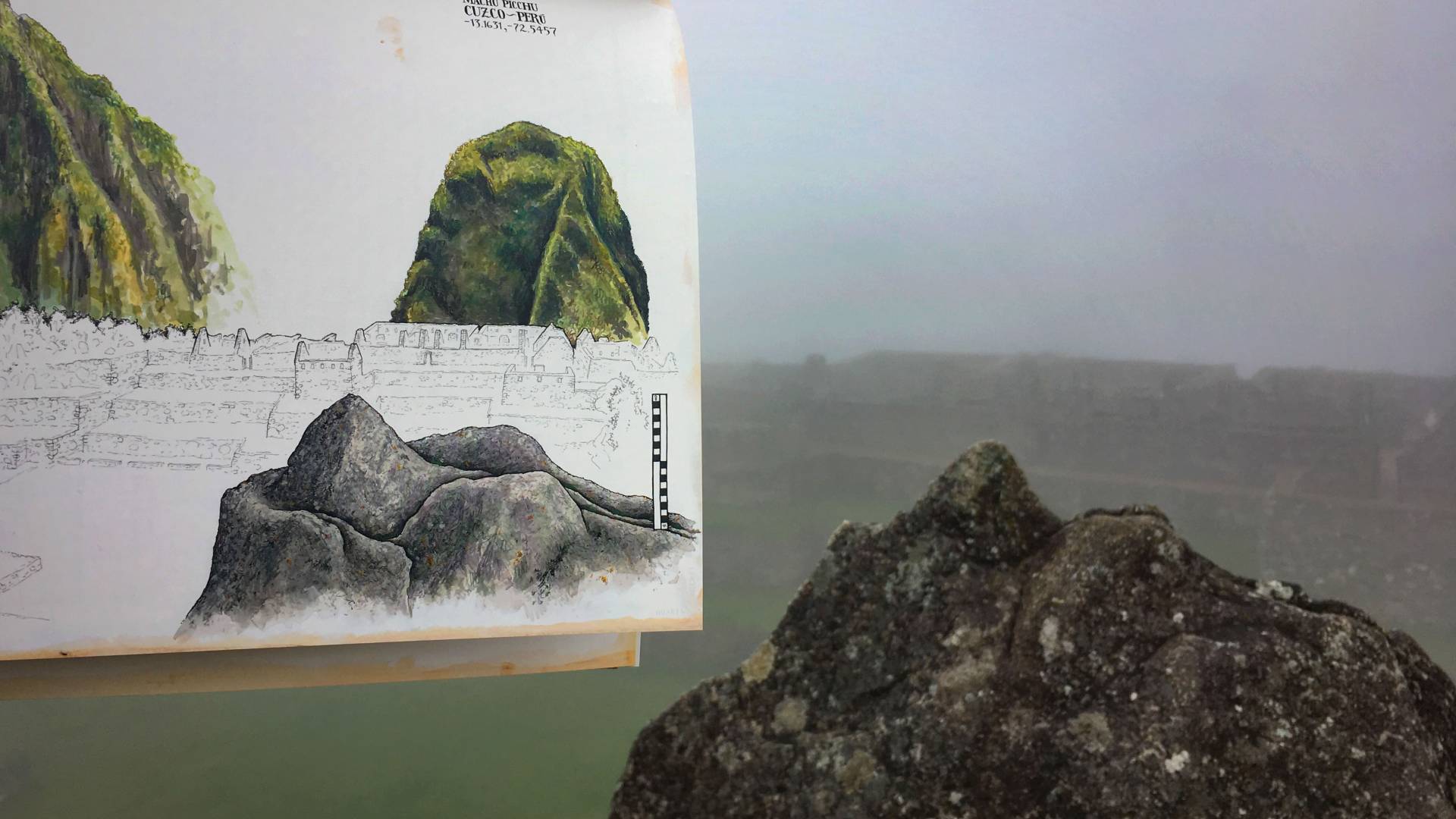 Page from book side-by-side original landscape in background