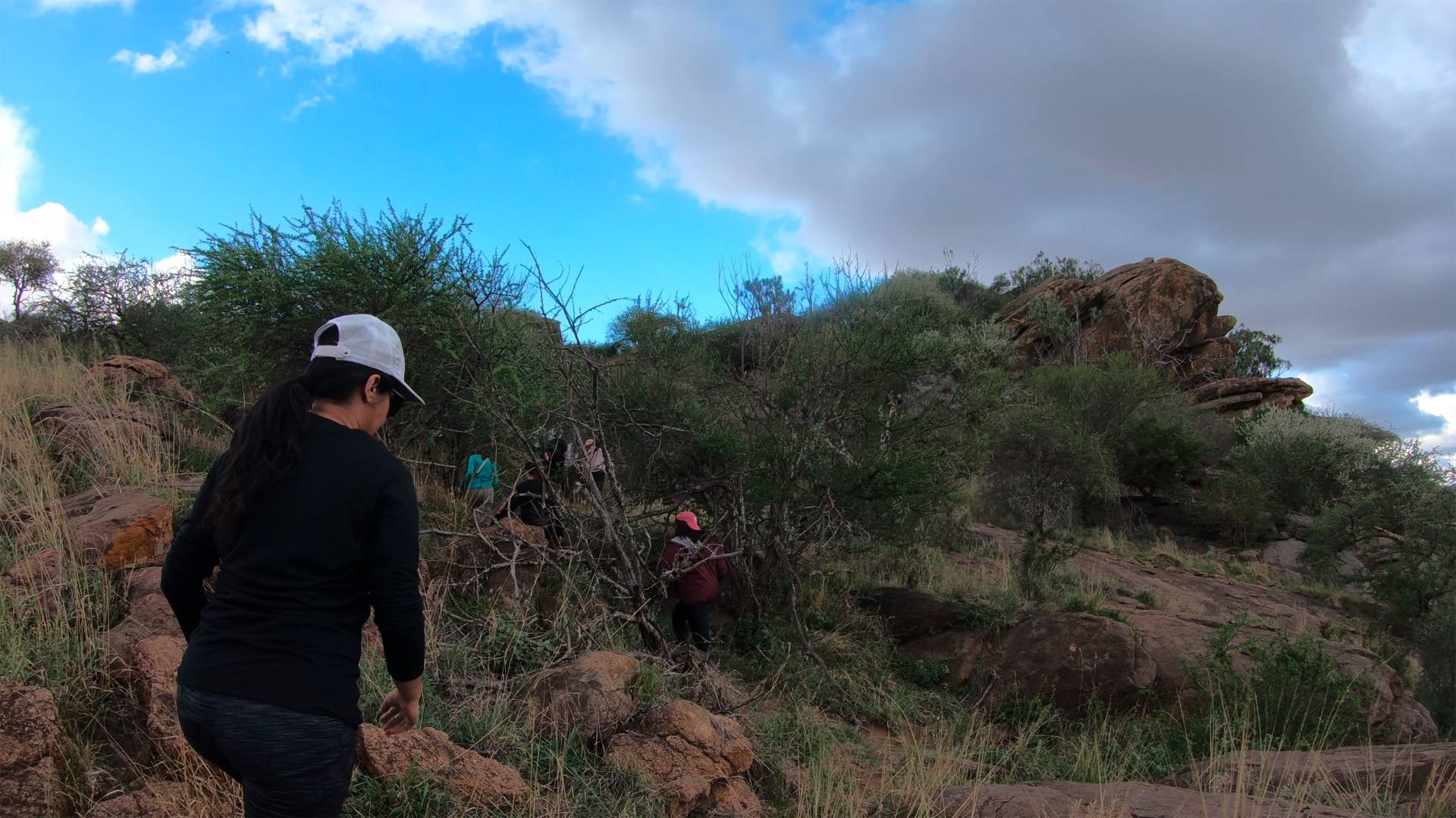 Students hiking up Mt. Mukenya
