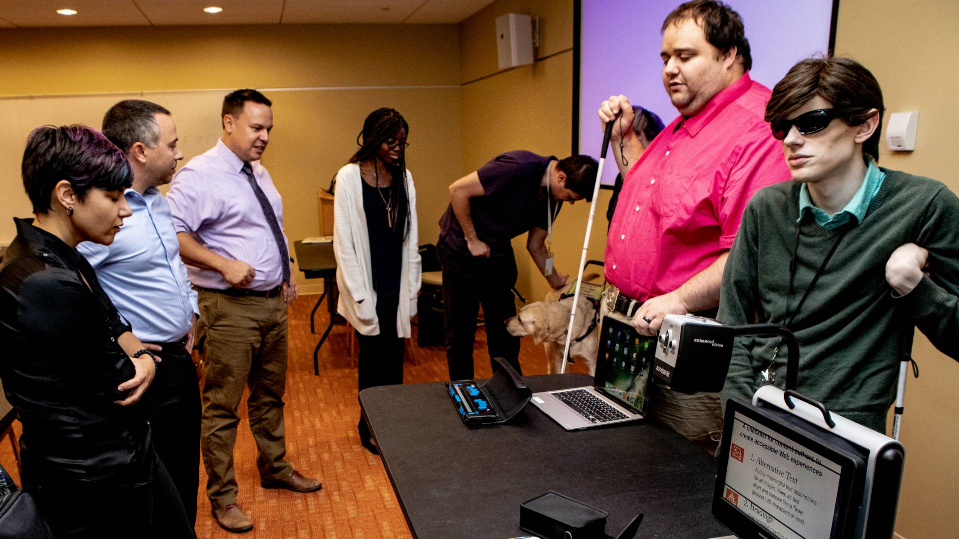 Representatives of the New Jersey Commission for the Blind and Visually Impaired demonstrate special screen readers for people with visual impairments