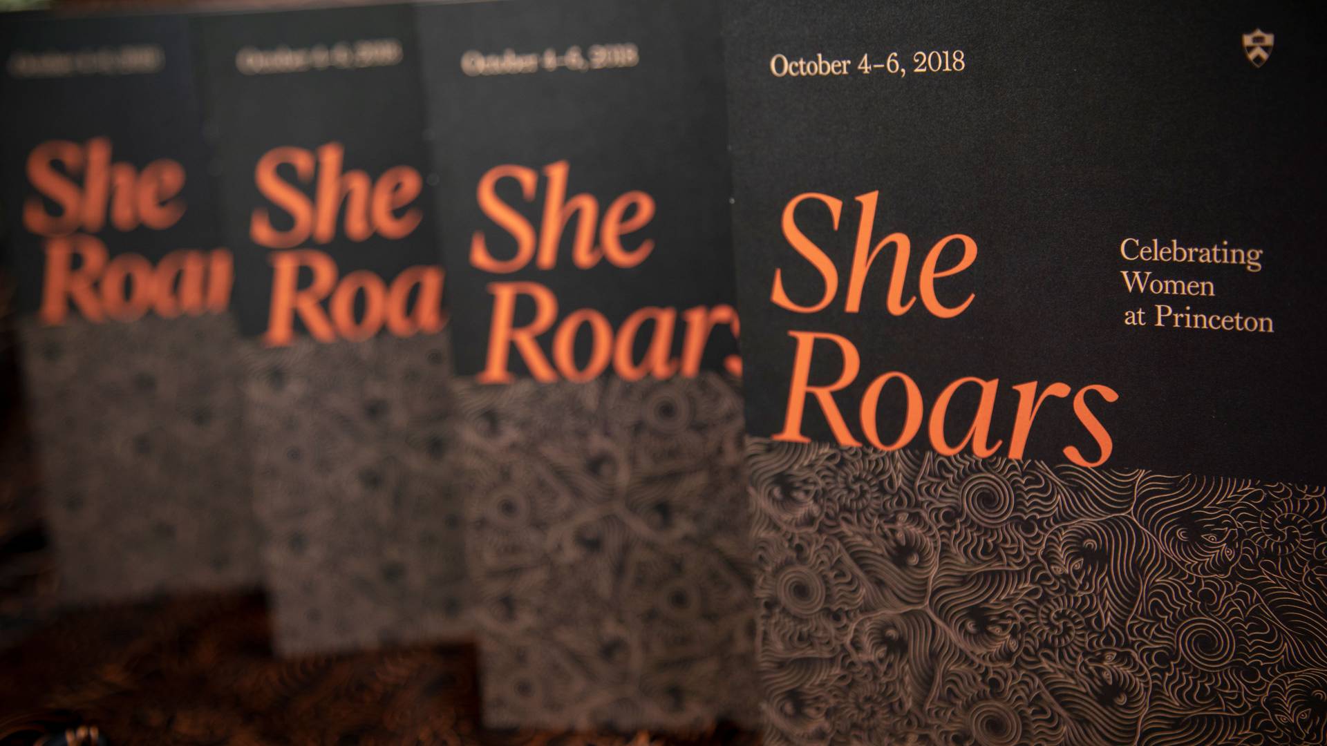 Array of She Roars programs that say "October 4-6, 2018; She Roars; Celebrating Women at Princeton"