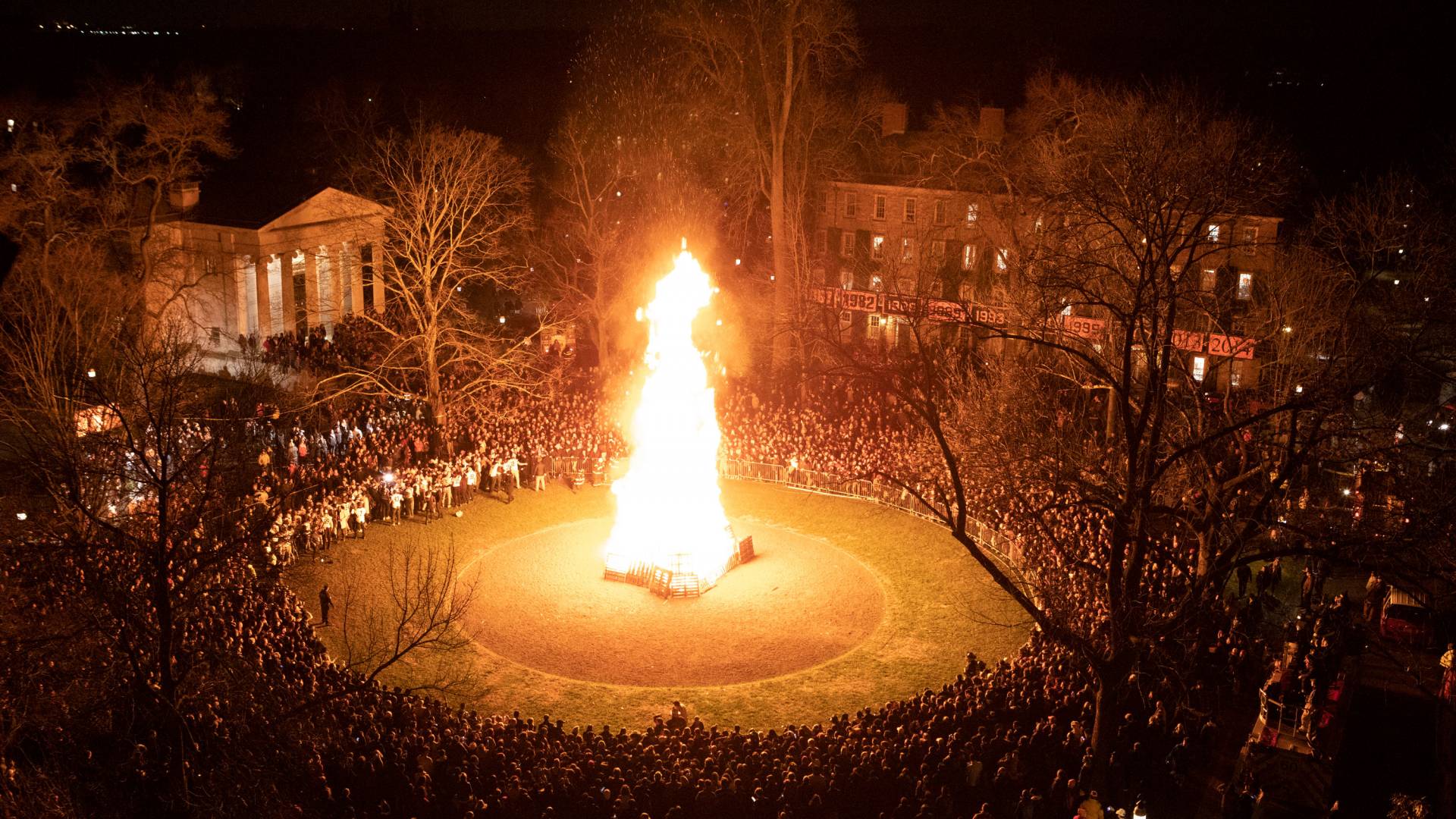 The bonfire from afar with thousands of students gathered around it