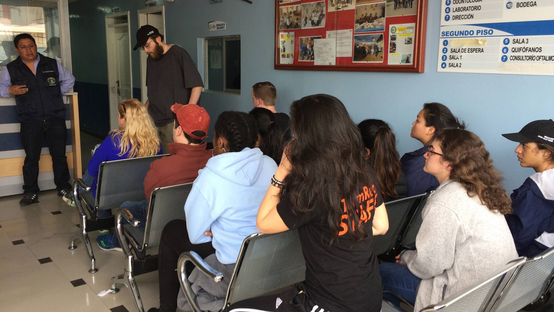 Students listening to speaker in Ecuador