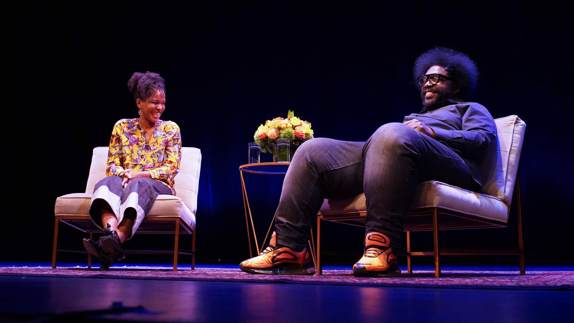Imani Perry and Questlove speaking with each other on stage