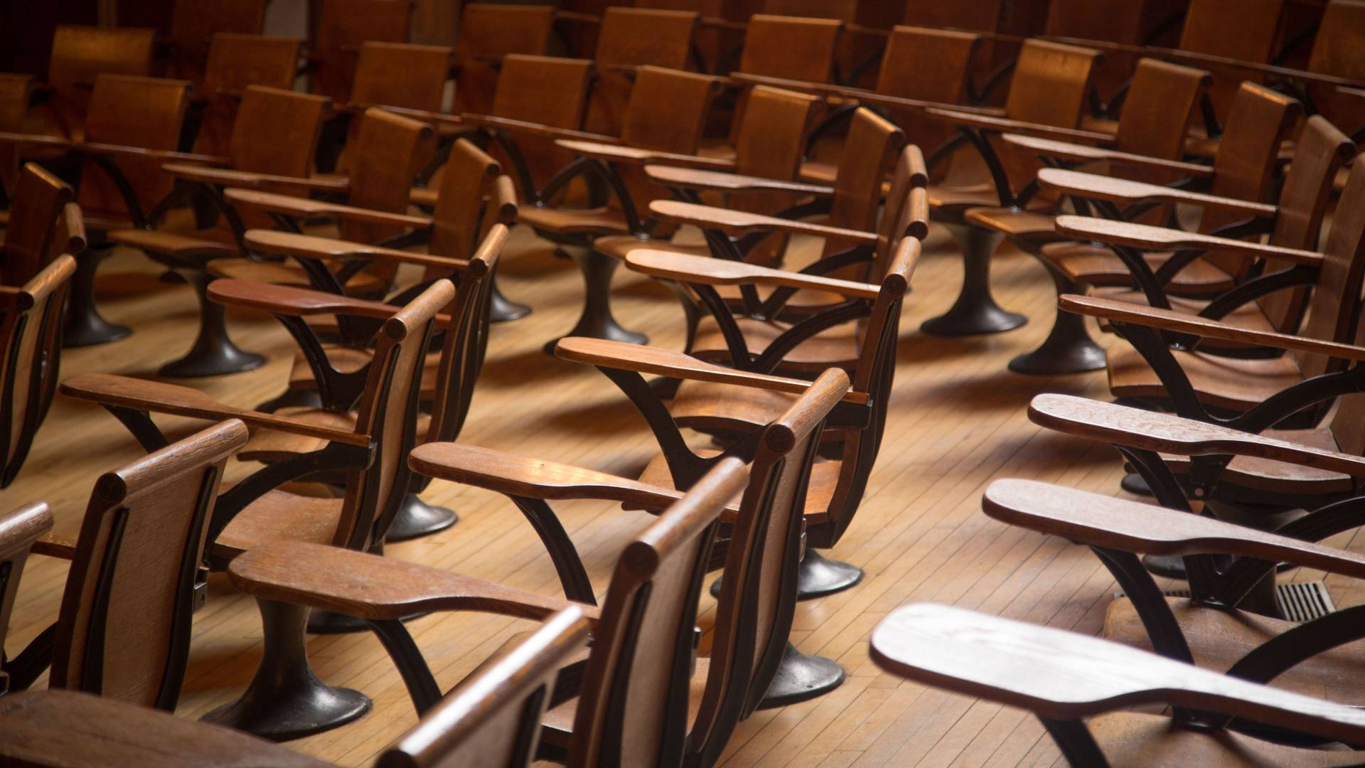 Empty room of wooden student desks