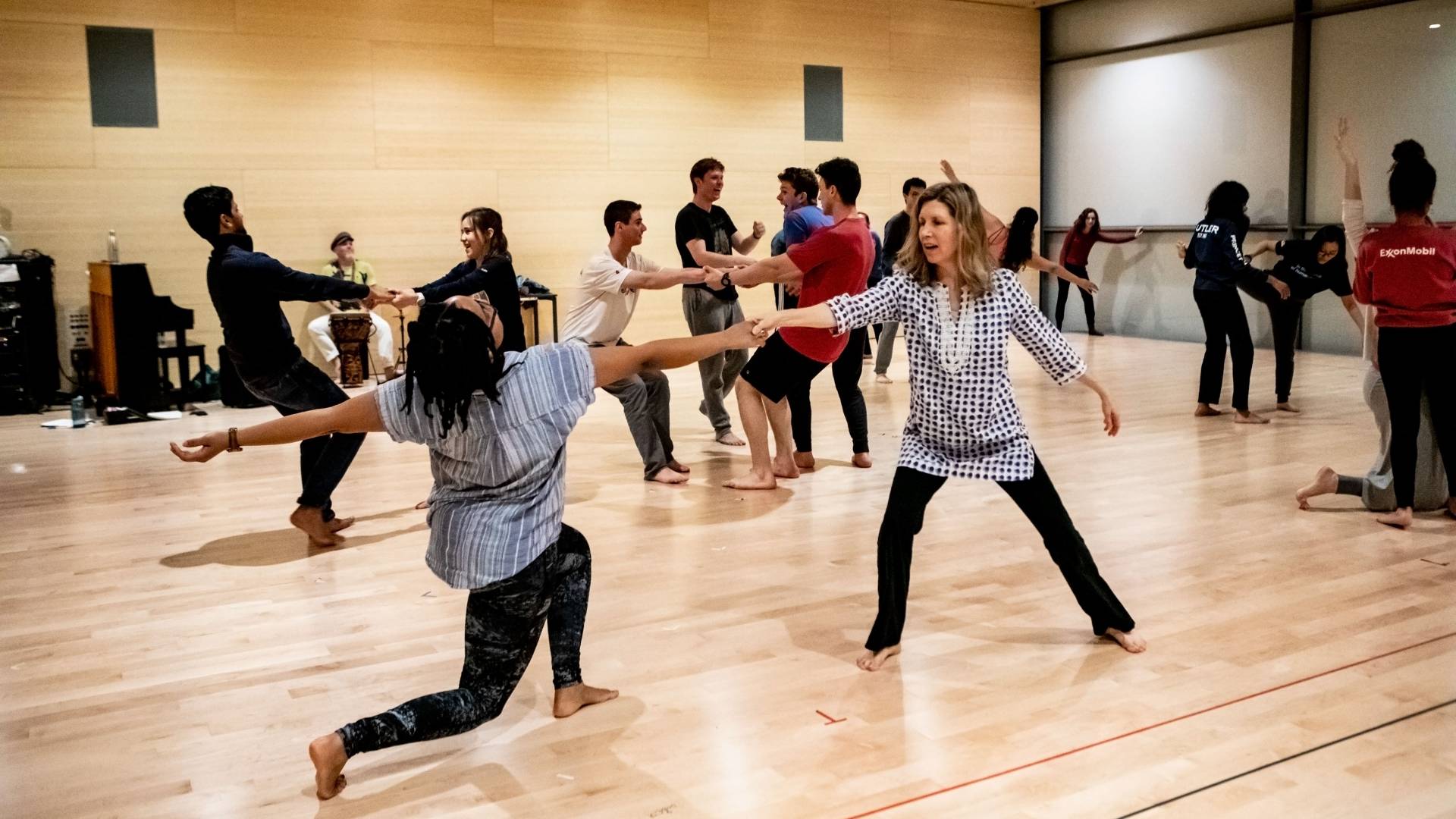 Students and faculty dancing in dance class
